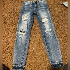 KanCan signature dark wash skinny jeans.